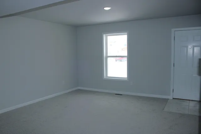 an empty room with a window