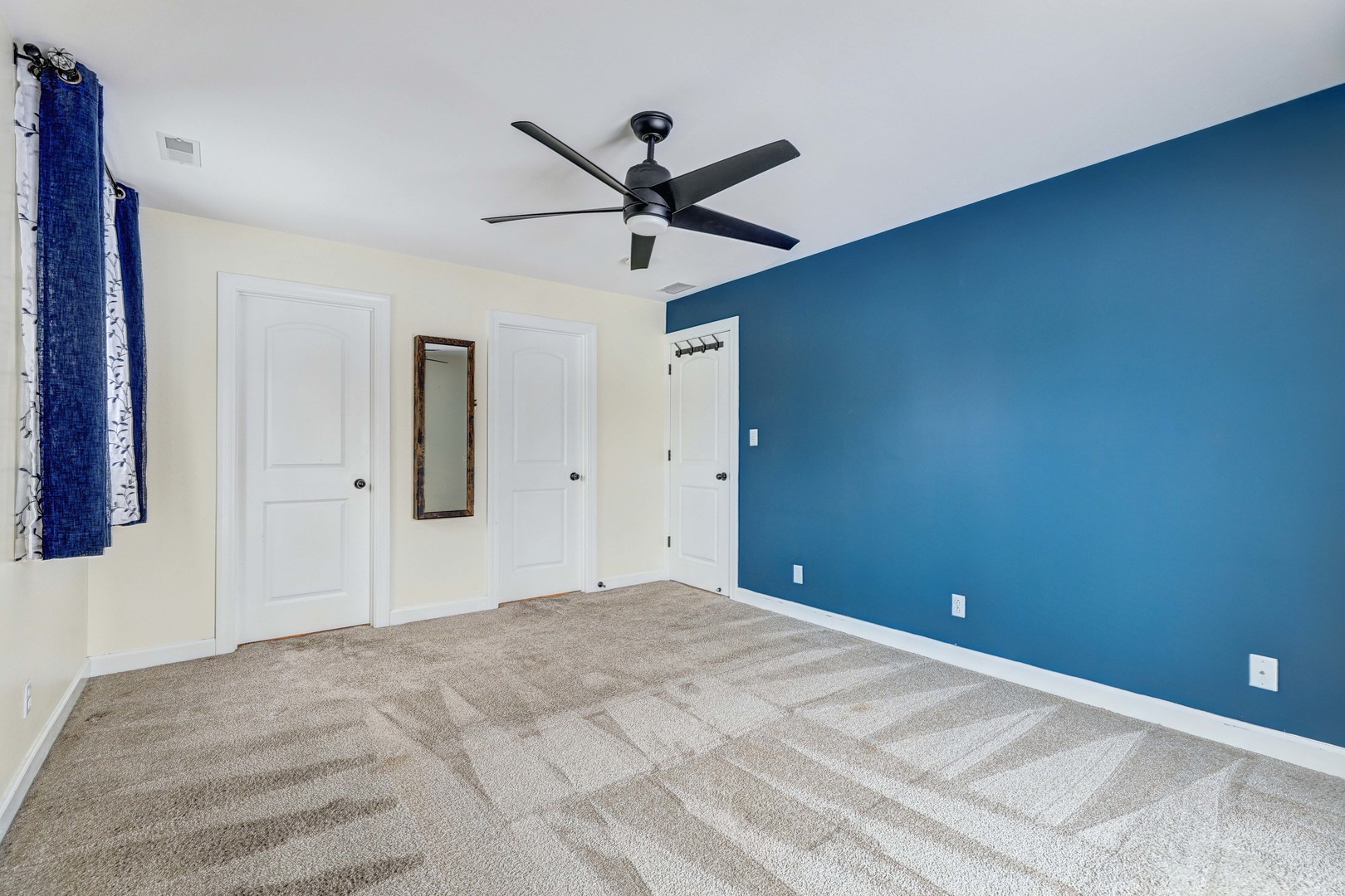3901 Weathervane Lane Crystal Lake, IL 60012 - Photo 18 of 36 a view of a big room with wooden floor and windows in a room