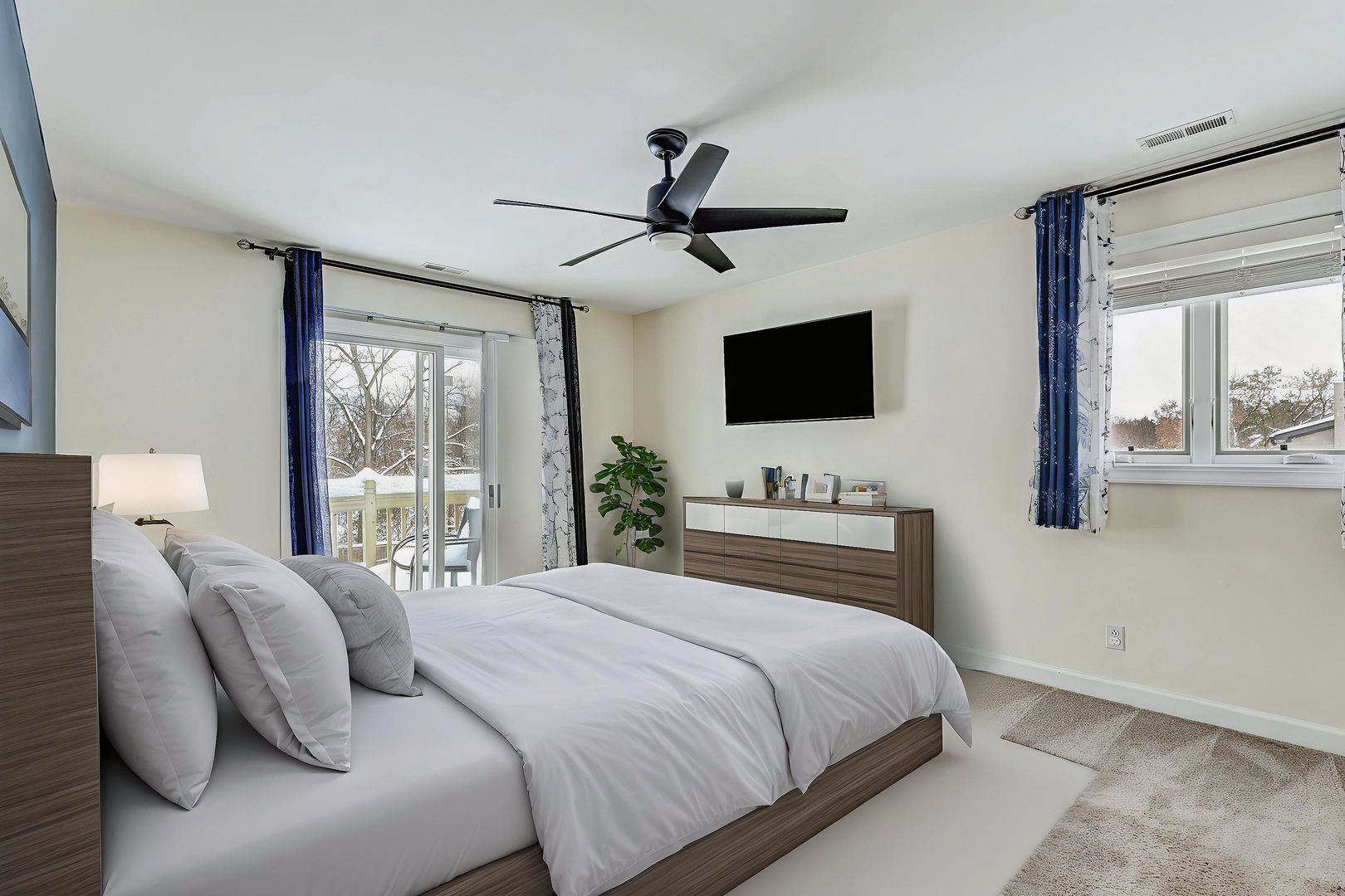 3901 Weathervane Lane Crystal Lake, IL 60012 - Photo 19 of 36 a bedroom with a large bed and a flat screen tv