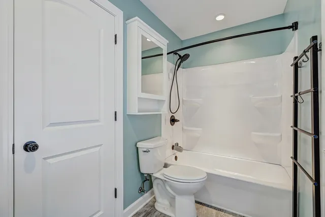 a room with pool table and flat screen tv