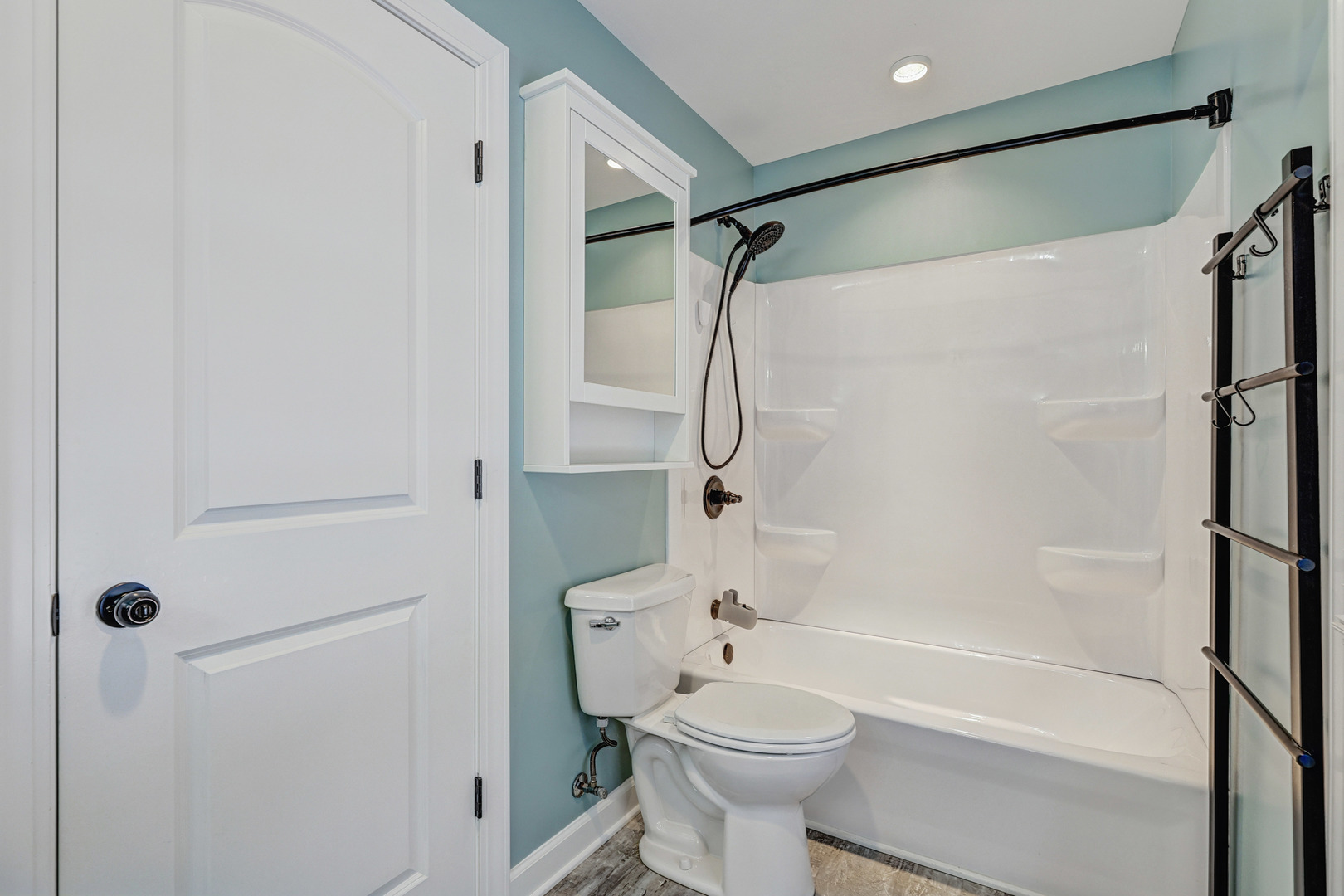 3901 Weathervane Lane Crystal Lake, IL 60012 - Photo 31 of 36 a bathroom with a toilet and a shower