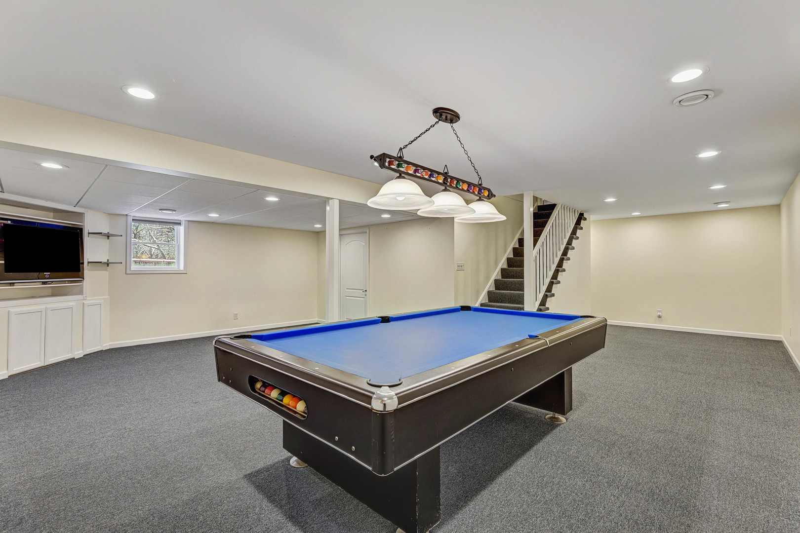 3901 Weathervane Lane Crystal Lake, IL 60012 - Photo 32 of 36 a room with pool table and flat screen tv