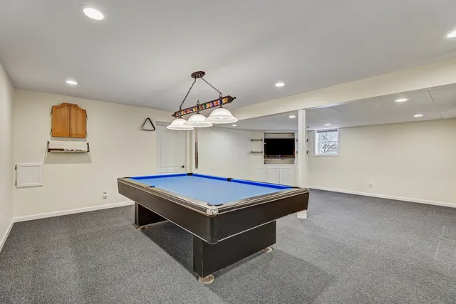 an empty room with a empty space and windows