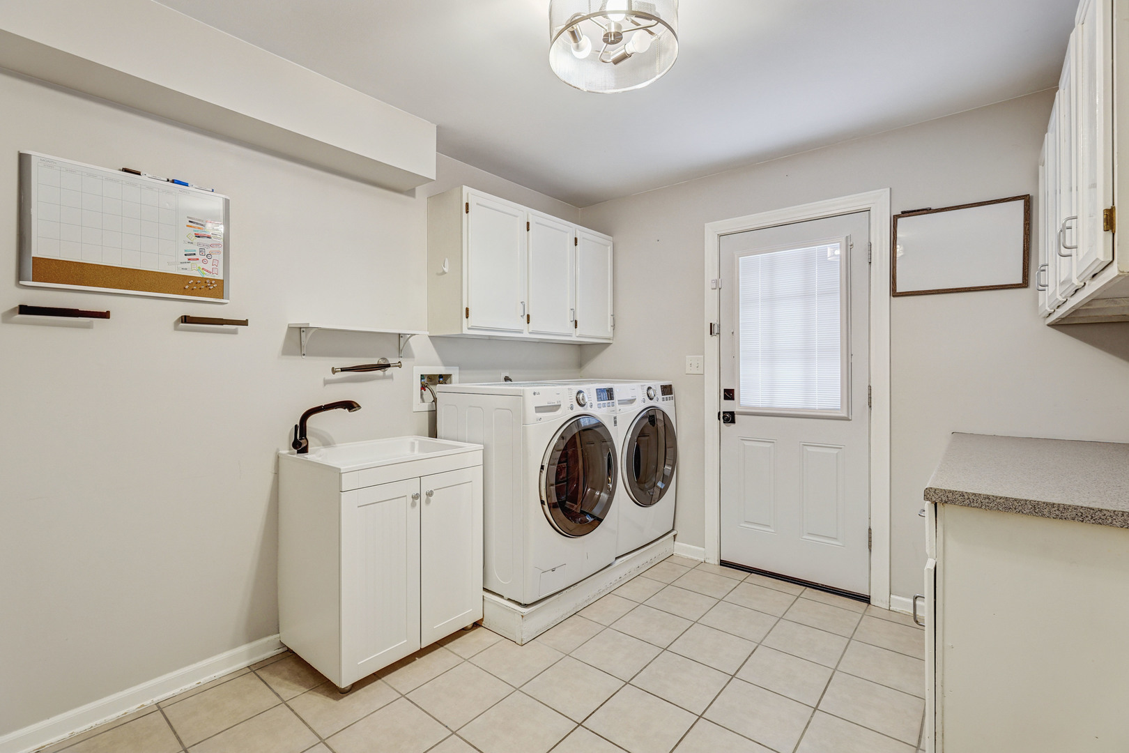 3901 Weathervane Lane Crystal Lake, IL 60012 - Photo 36 of 36 a utility room with dryer and washer