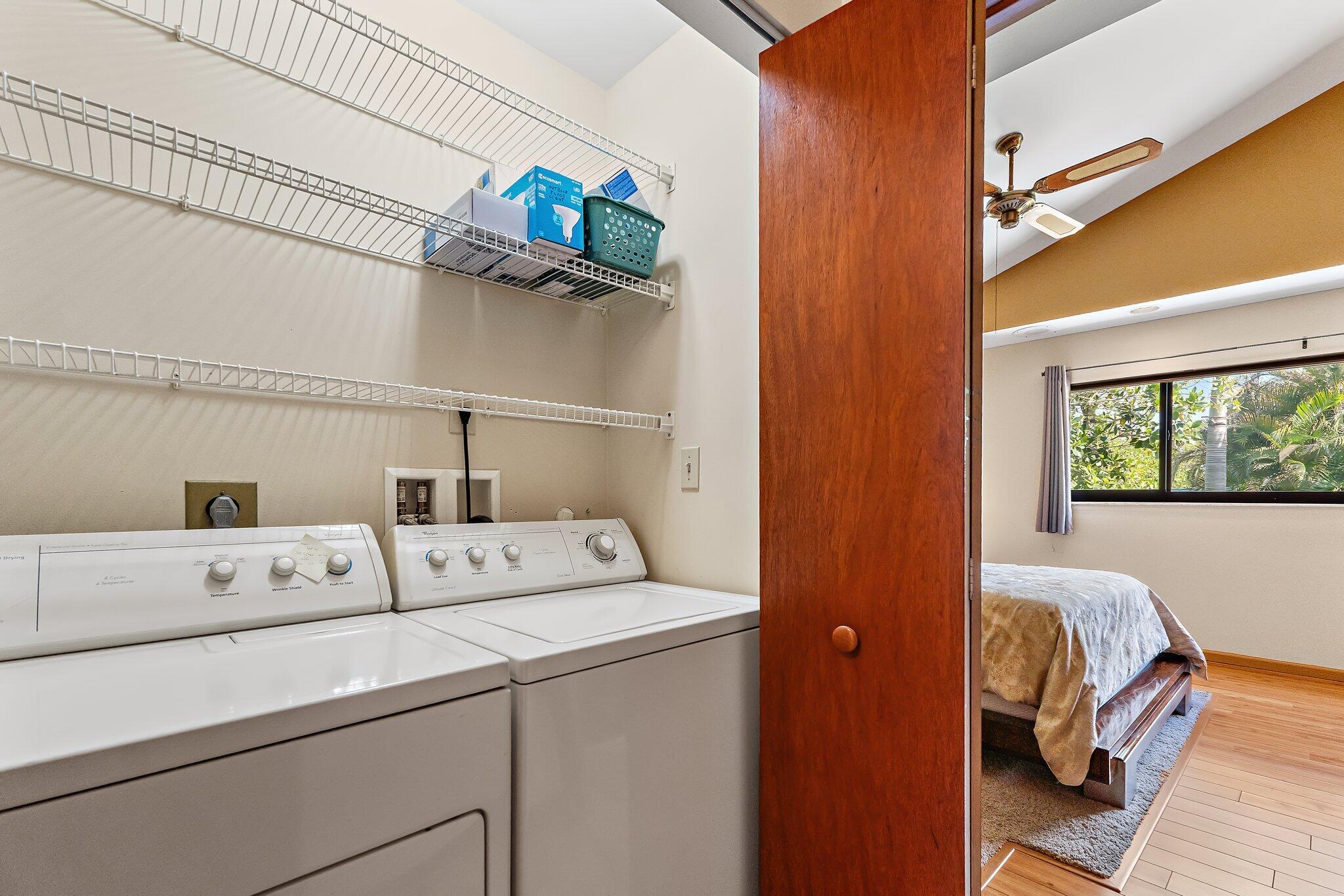 702 Warren Drive Jupiter, FL 33458 - Photo 49 of 76 a utility room with dryer and washer