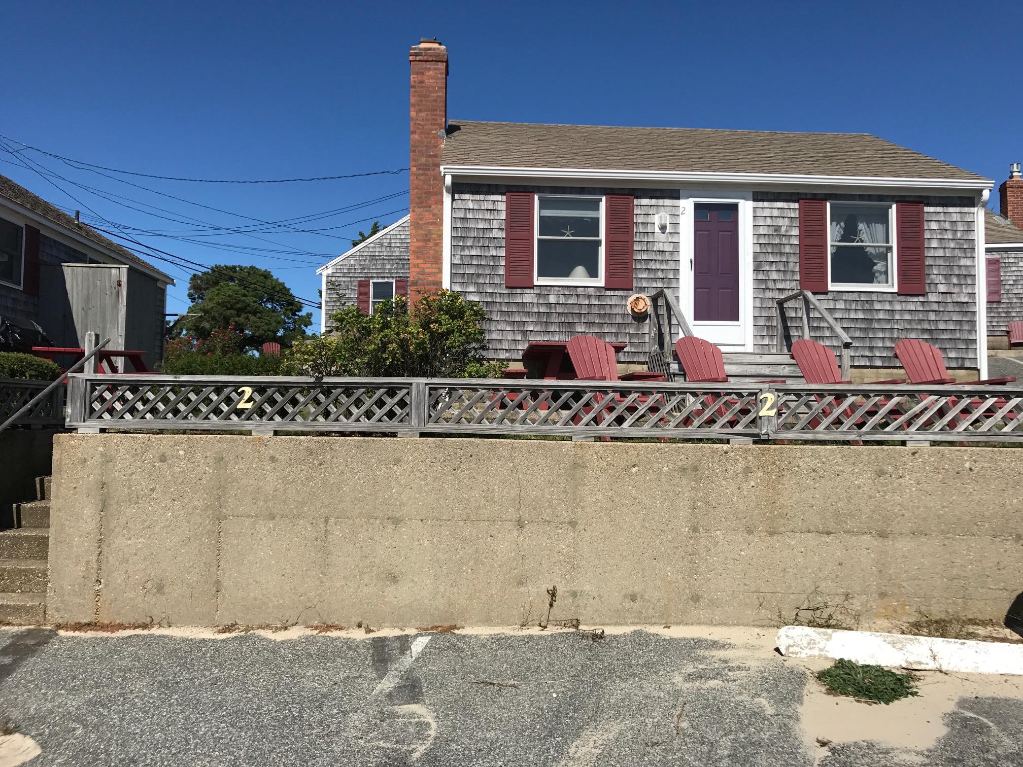 140 Old Wharf Road, Unit 2 Dennis Port, MA 02639 - Photo 20 of 22 a front view of a house