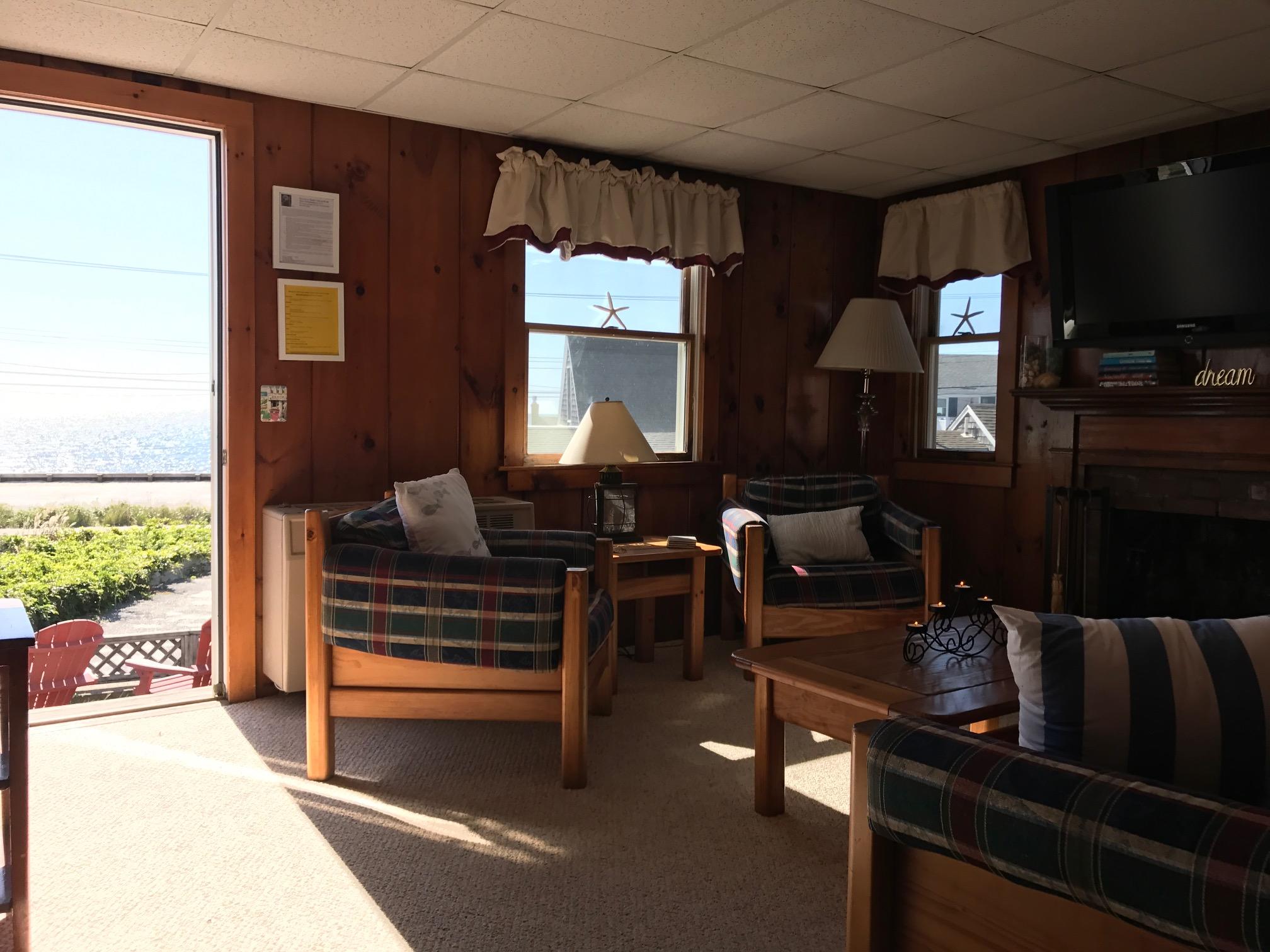 140 Old Wharf Road, Unit 2 Dennis Port, MA 02639 - Photo 4 of 22 a living room with furniture