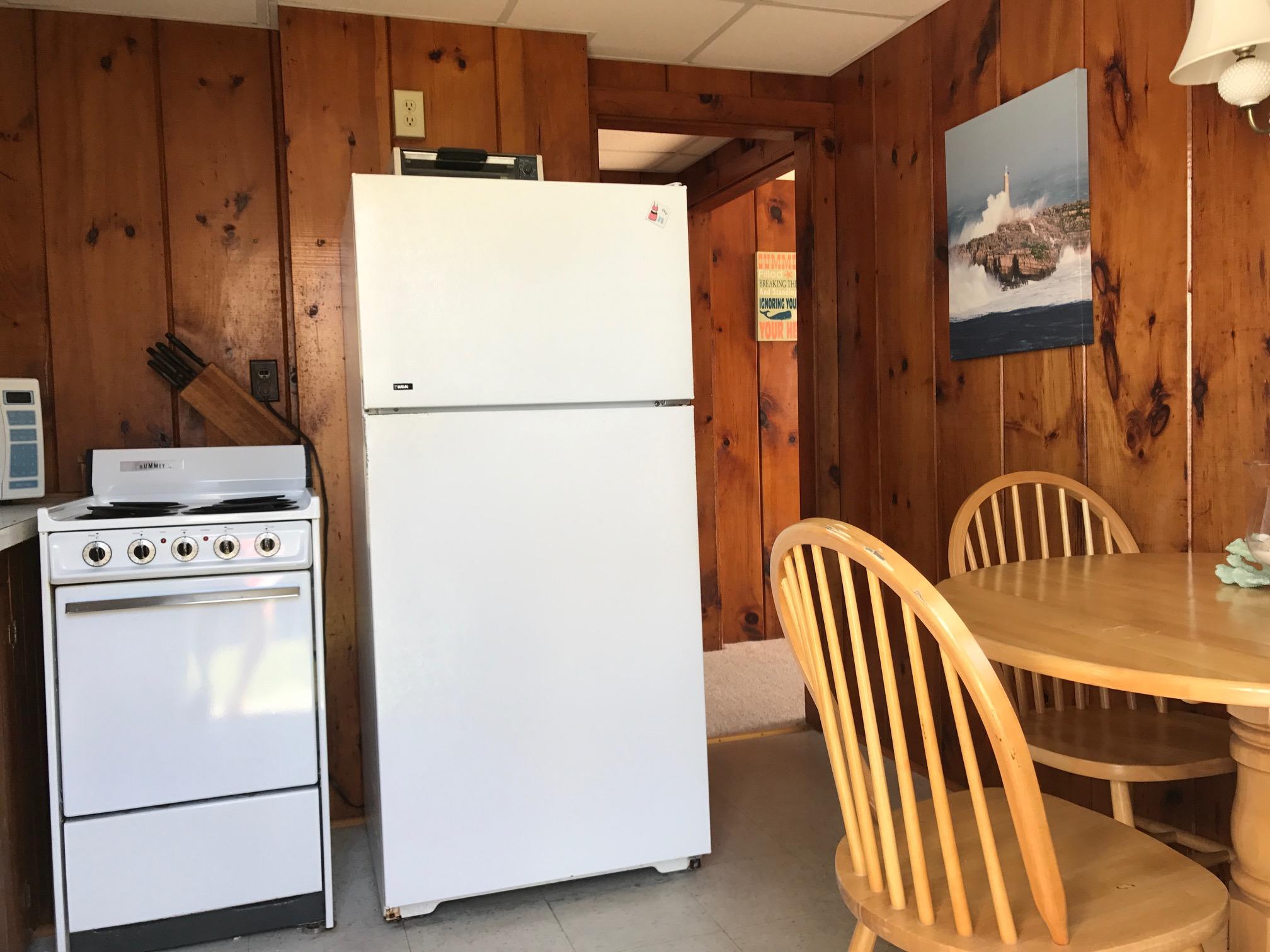 140 Old Wharf Road, Unit 2 Dennis Port, MA 02639 - Photo 8 of 22 a view of kitchen and utility room