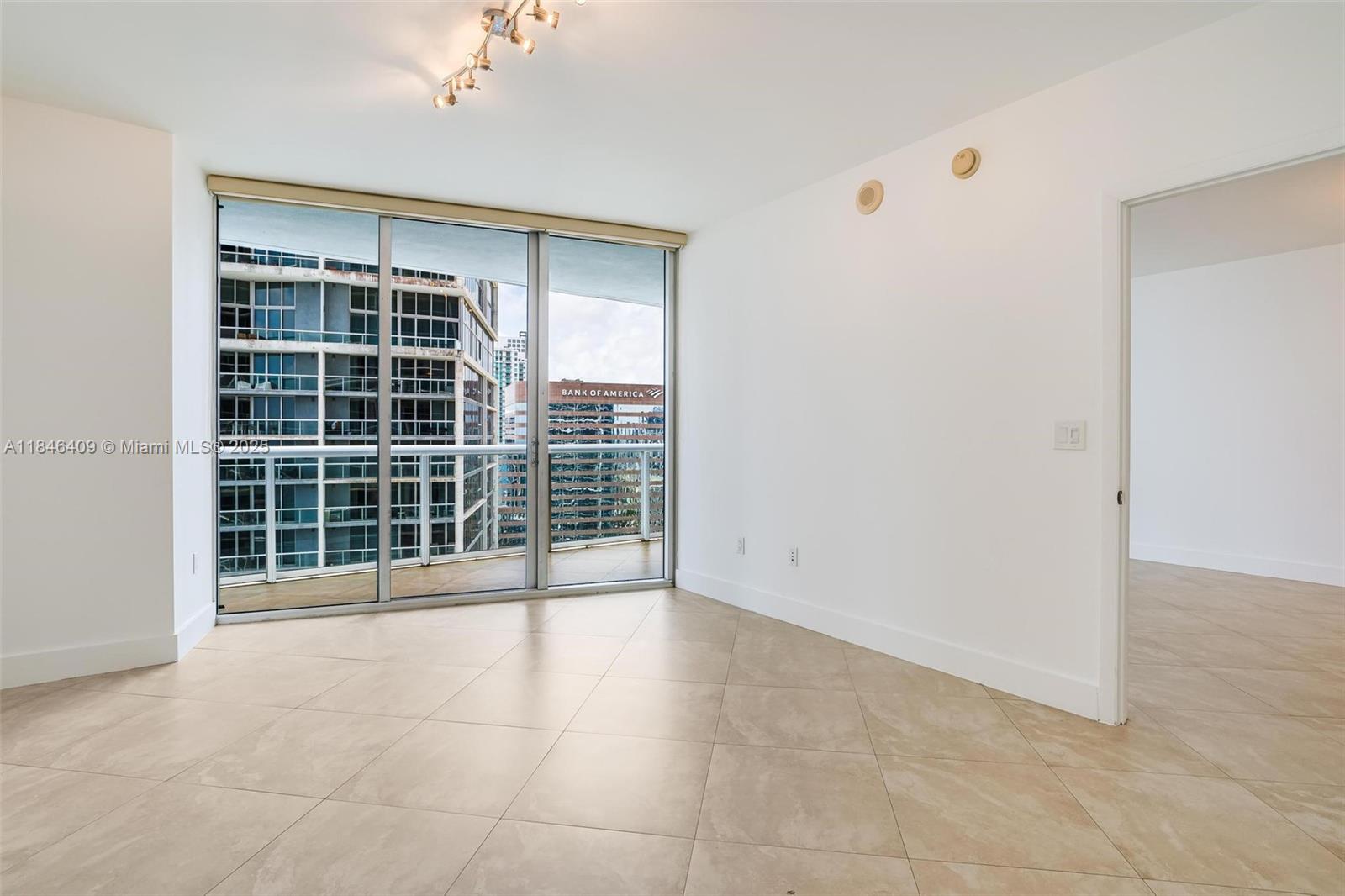 475 Brickell Avenue, Unit 3811 Miami, FL 33131 - Photo 16 of 21 a view of an empty room with a window