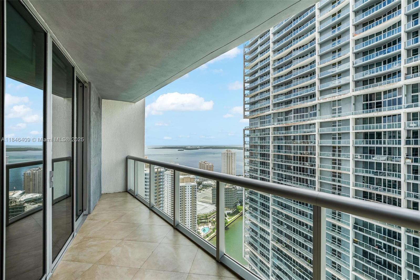 475 Brickell Avenue, Unit 3811 Miami, FL 33131 - Photo 5 of 21 a view of balcony with wooden floor