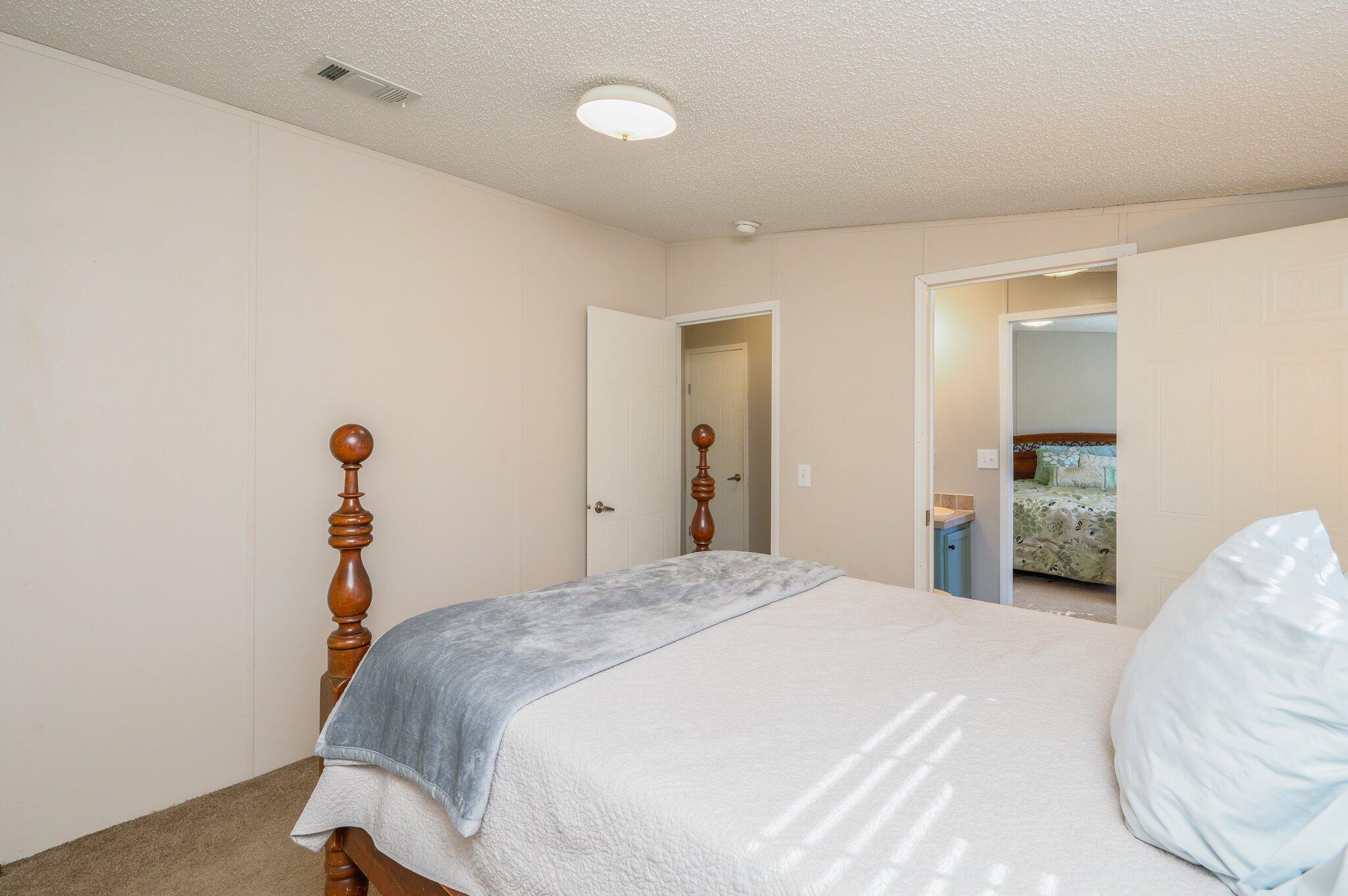1078 Wallace Road DeFuniak Springs, FL 32433 - Photo 23 of 46 a bedroom with bed and window