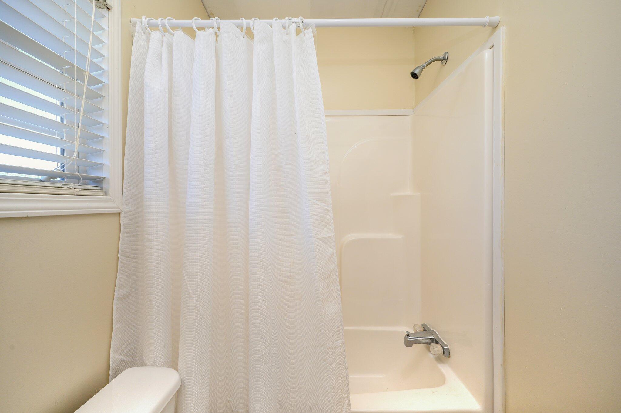 1078 Wallace Road DeFuniak Springs, FL 32433 - Photo 27 of 46 a bathroom with a shower curtain and sink