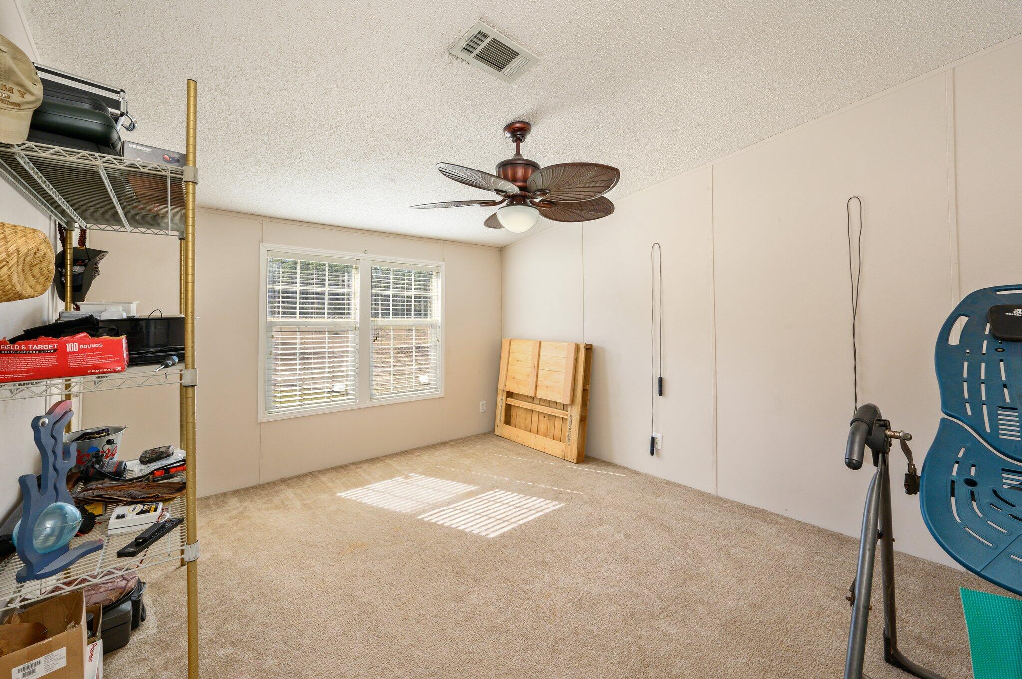 1078 Wallace Road DeFuniak Springs, FL 32433 - Photo 28 of 46 a view of a room with gym equipment