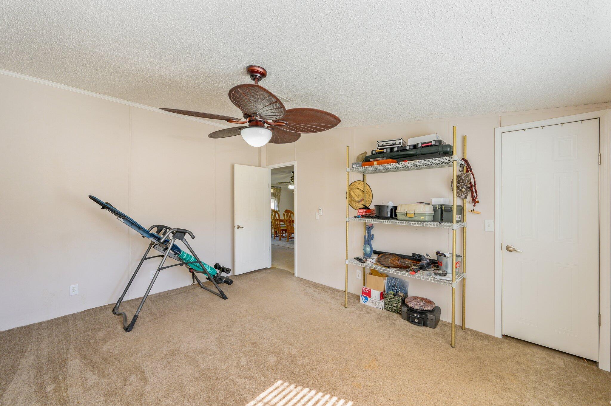 1078 Wallace Road DeFuniak Springs, FL 32433 - Photo 29 of 46 a view of a room with gym equipment