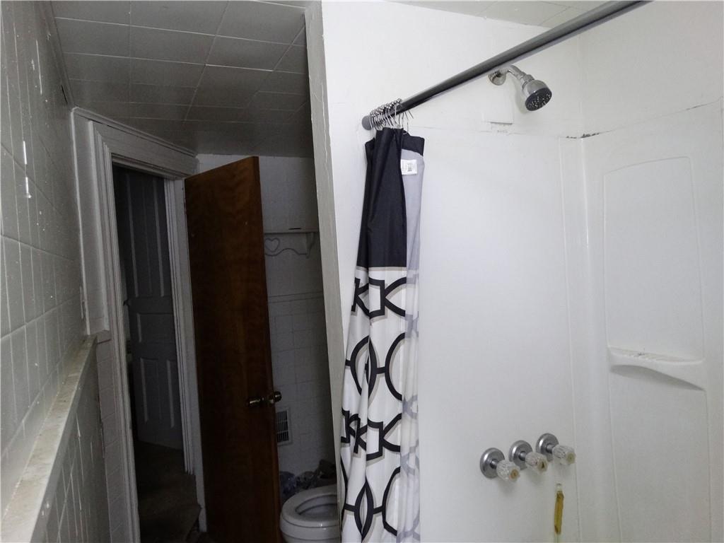 115 Cutler Street McKees Rocks, PA 15136 - Photo 8 of 21 a bathroom with a shower