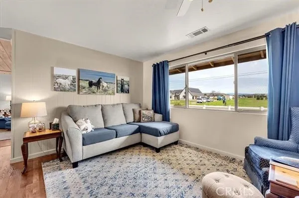 a bedroom with a bed and a table in it