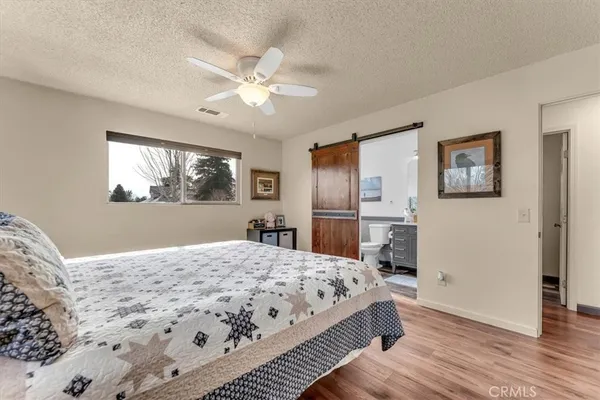 a bathroom with a sink vanity and a mirror
