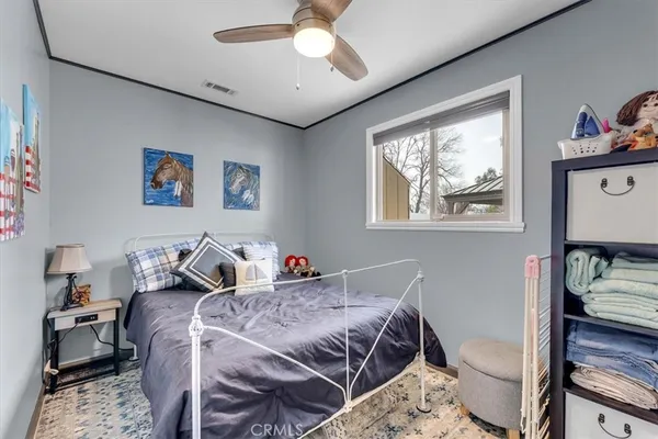 a view of a workspace with furniture and a couch