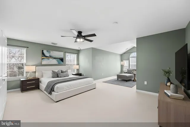 a view of an empty room with a fireplace