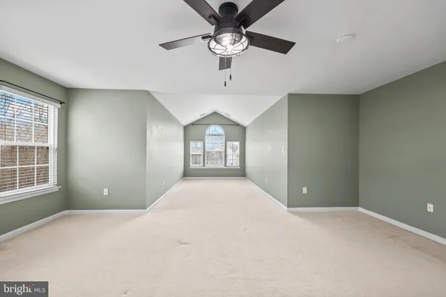 a view of a livingroom with a ceiling fan
