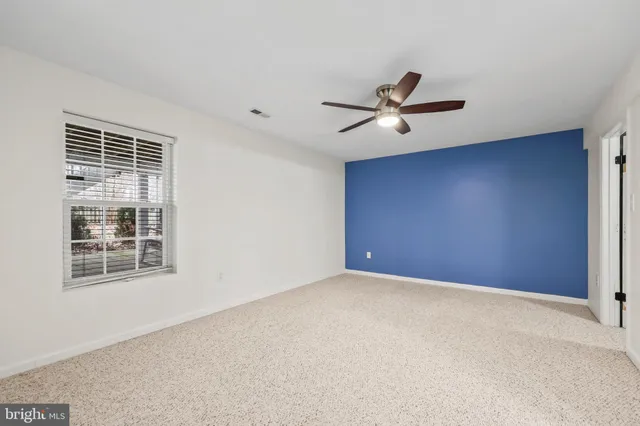 a view of house with a yard