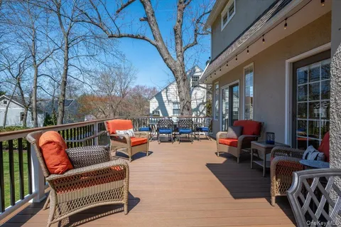 a park view with a bench and trees