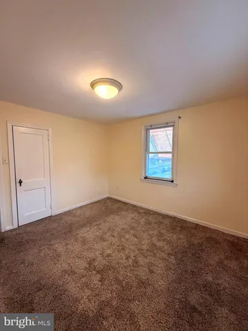 an empty room with an entryway