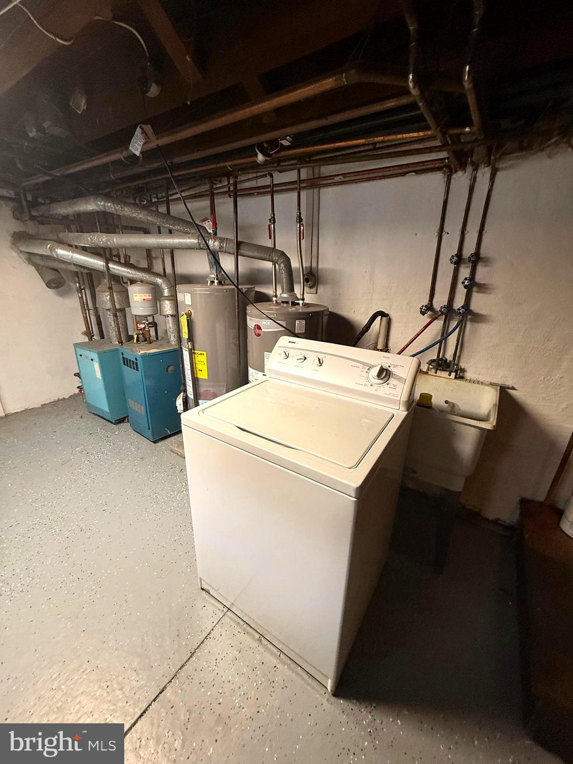 4401 Bleigh Avenue, Unit 2 Philadelphia, PA 19136 - Photo 24 of 25 a utility room with dryer and washer