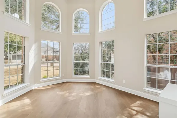 an empty room with windows