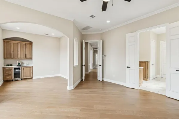 a view of a kitchen with a sink and dishwasher cabinets