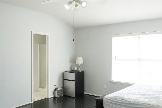a bathroom with a toilet and a sink