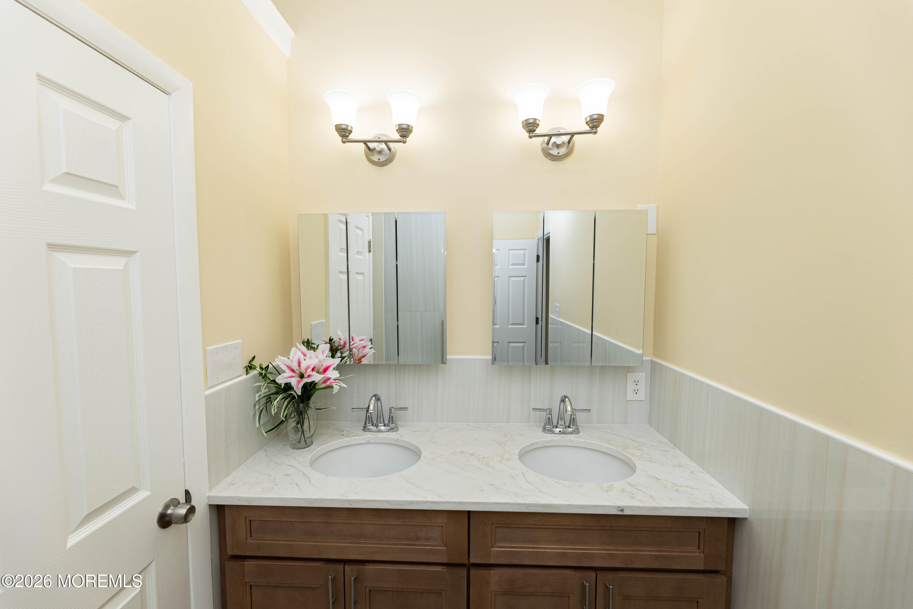 2408 Herbertsville Road Point Pleasant, NJ 08742 - Photo 39 of 82 a bathroom with a sink and a mirror