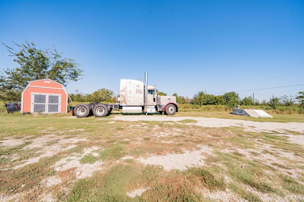 1524 Crowell Road Kaufman, TX 75142 - Photo 25 of 28 a car parked on the side of the road