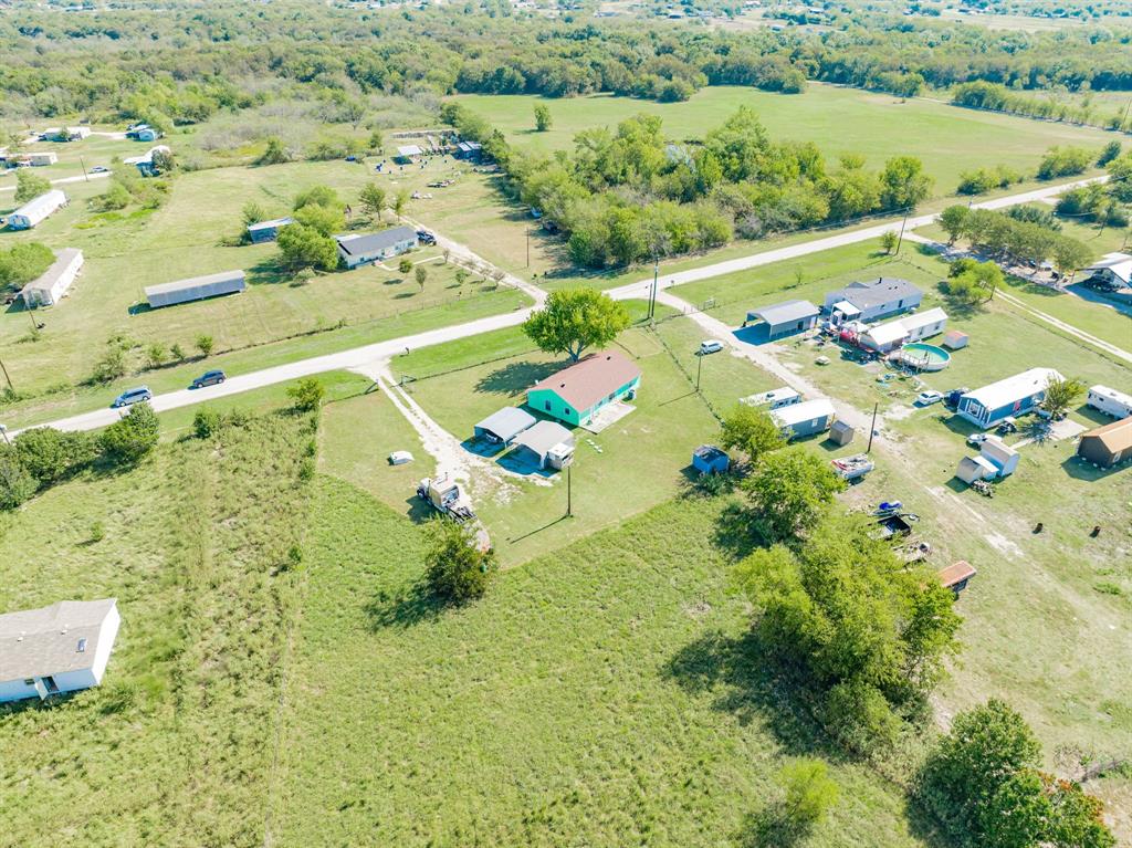 1524 Crowell Road Kaufman, TX 75142 - Photo 3 of 28 a view of a garden with an outdoor space