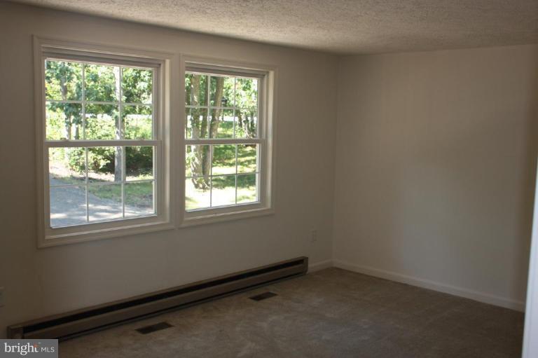 12908 Rousby Hall Road Lusby, MD 20657 - Photo 13 of 15 Living Room