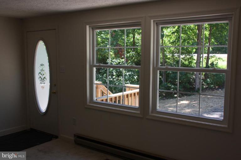 12908 Rousby Hall Road Lusby, MD 20657 - Photo 14 of 15 Living Room #2