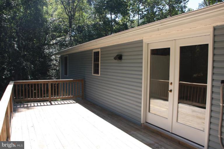12908 Rousby Hall Road Lusby, MD 20657 - Photo 3 of 15 Deck