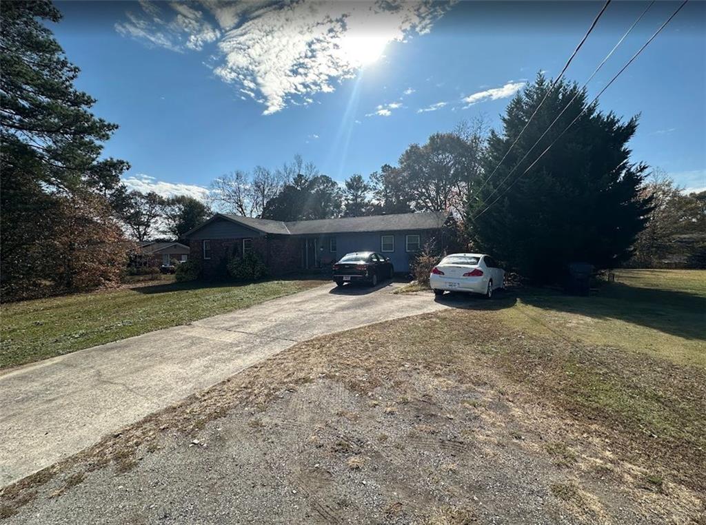 2170 Beaver Shop Road Marietta, GA 30066 - Photo 6 of 6 a view of a couches in a patio with a yard