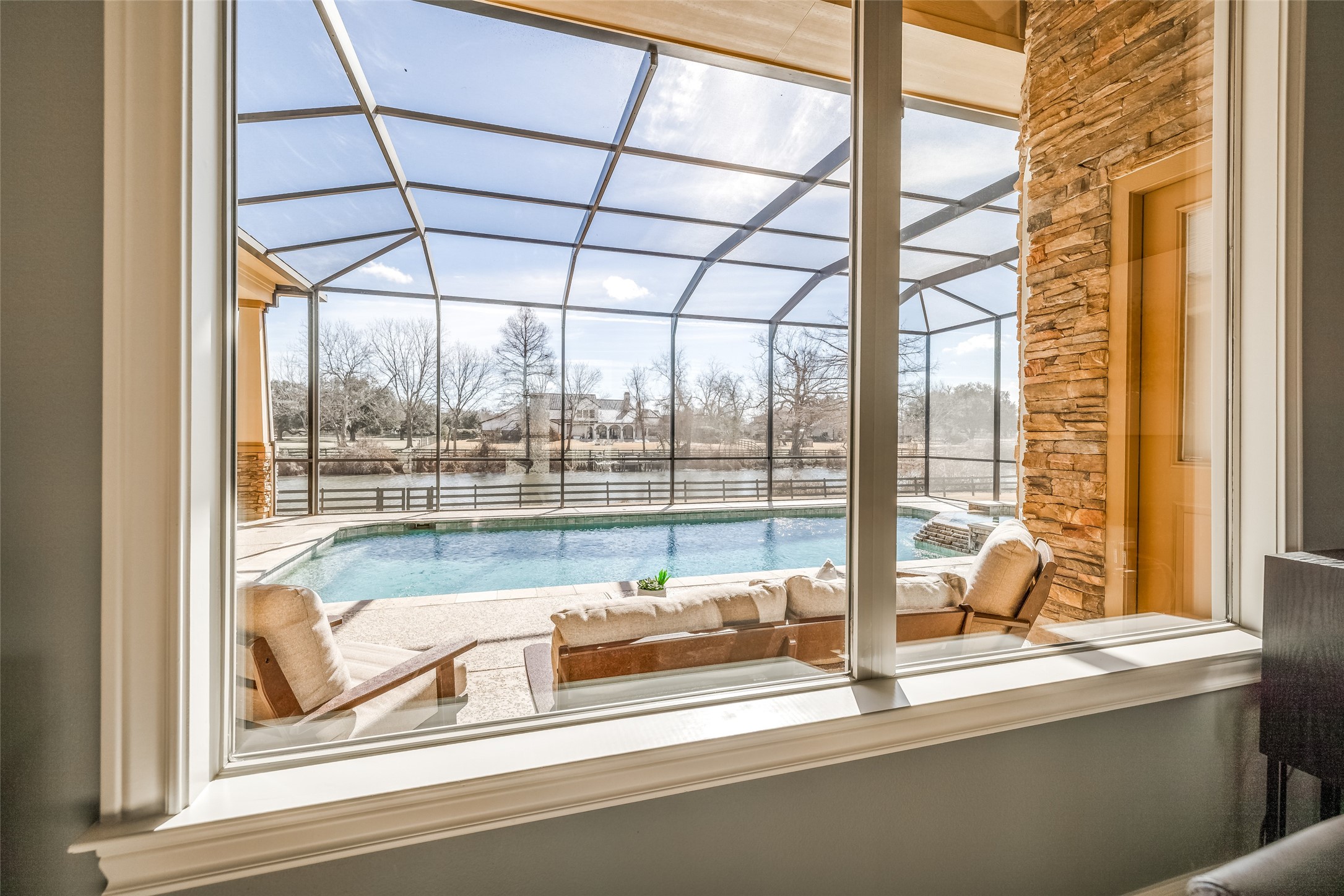 31102 Lower Oxbow Trace Fulshear, TX 77441 - Photo 8 of 50 Wonderful view out to the pool & Oxbow Lake from the dining room window