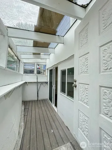 a view of a hallway with entryway