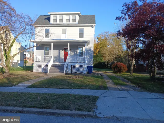 a front view of house with yard