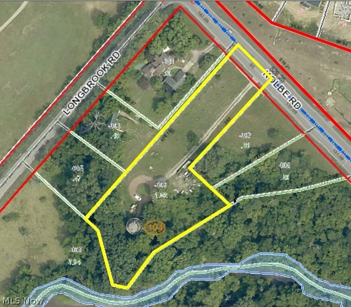 4630 Kolbe Road Lorain, OH 44053 - Photo 35 of 35 Windmill on 1.5 acres with fruit trees. Four additional half-acre lots available for purchase.