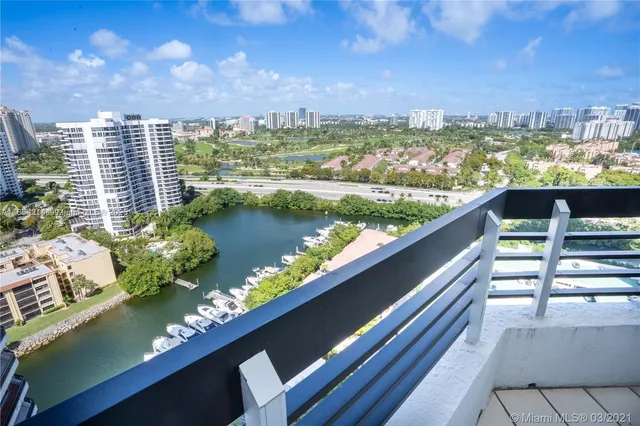 a balcony with a city view