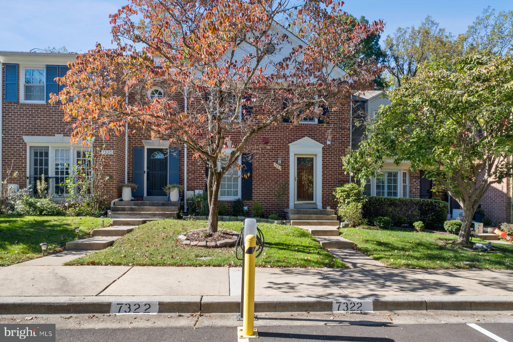 7322 Greentree Road Bethesda, MD 20817 - Photo 1 of 53 a front view of a house with a yard