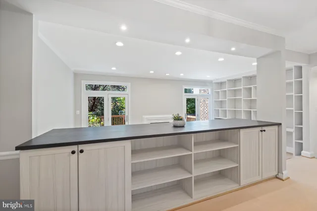 a kitchen with a sink and window