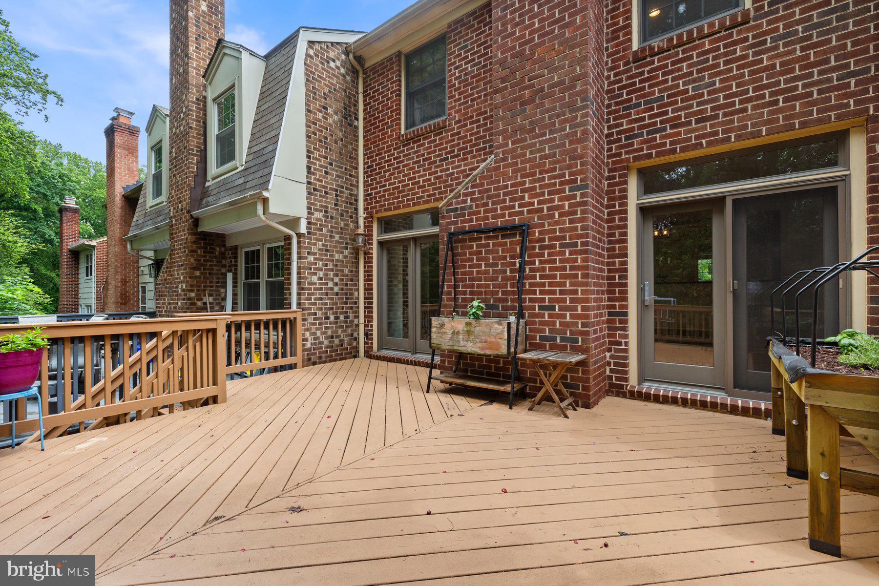 7322 Greentree Road Bethesda, MD 20817 - Photo 48 of 53 a view of a brick house with many windows