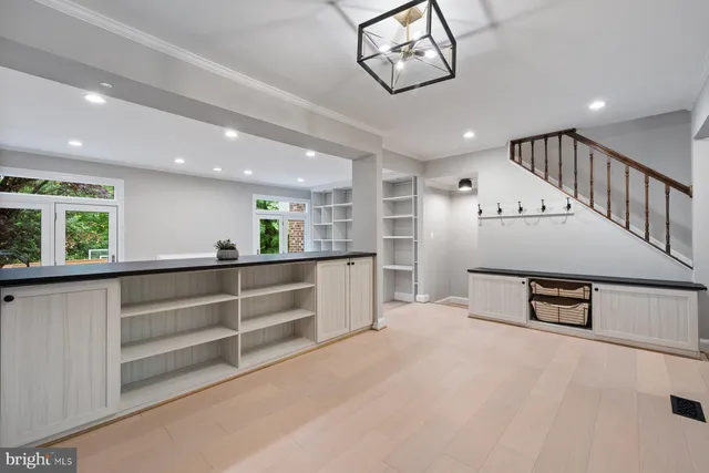 a view of kitchen with windows and furniture