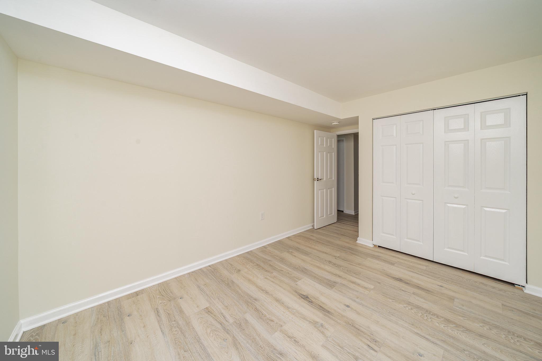 9910 Walker House Road, Unit 99104 Gaithersburg, MD 20886 - Photo 26 of 32 a view of an empty room