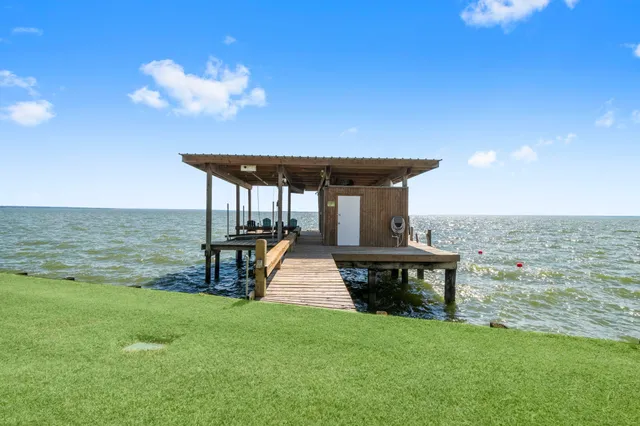 a view of a swimming pool with a patio