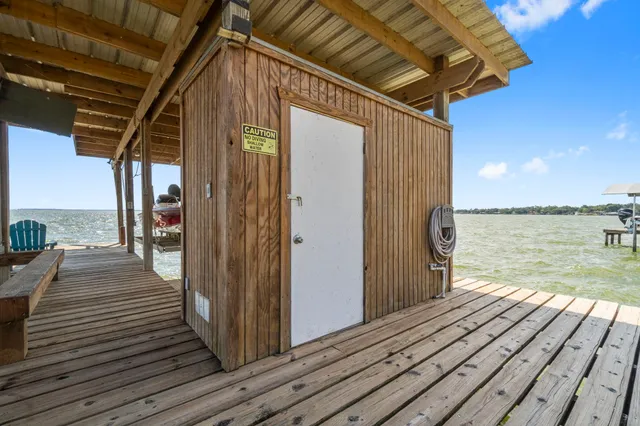 a view of a balcony with wooden floor